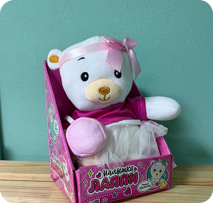Игрушка "Малышка в коробочке"